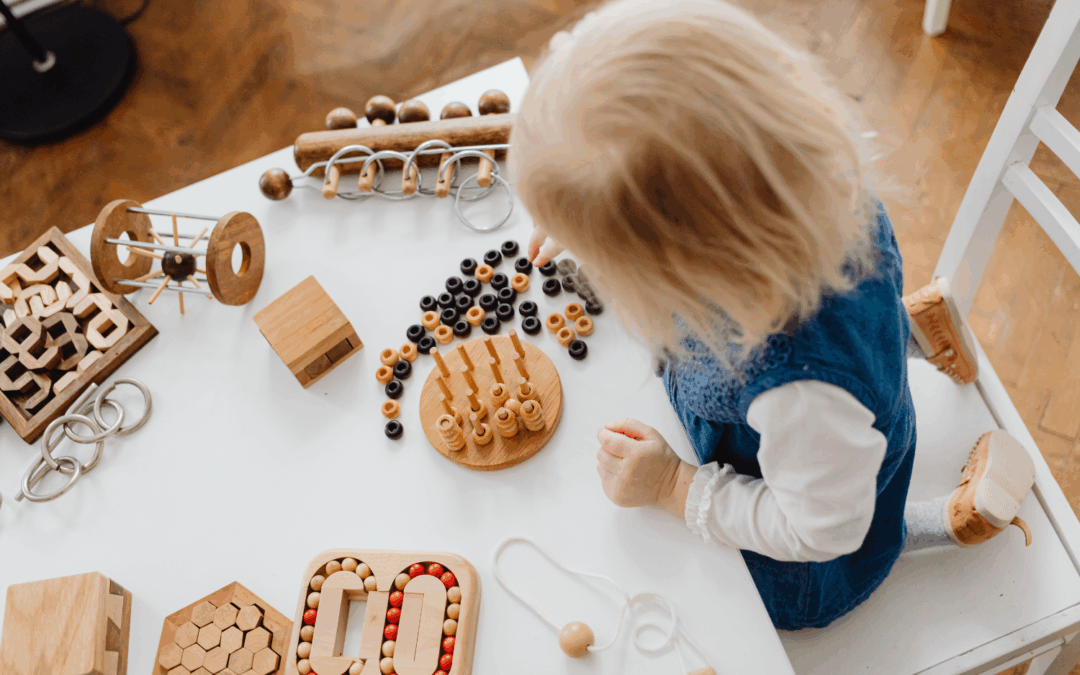 child playing with counting toys